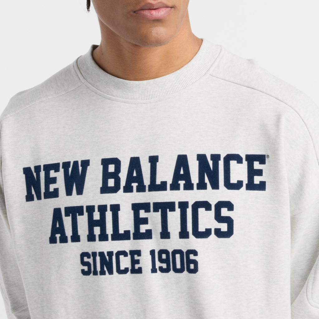 New Balance Varsity French Terry Graphic Crew in GRAU