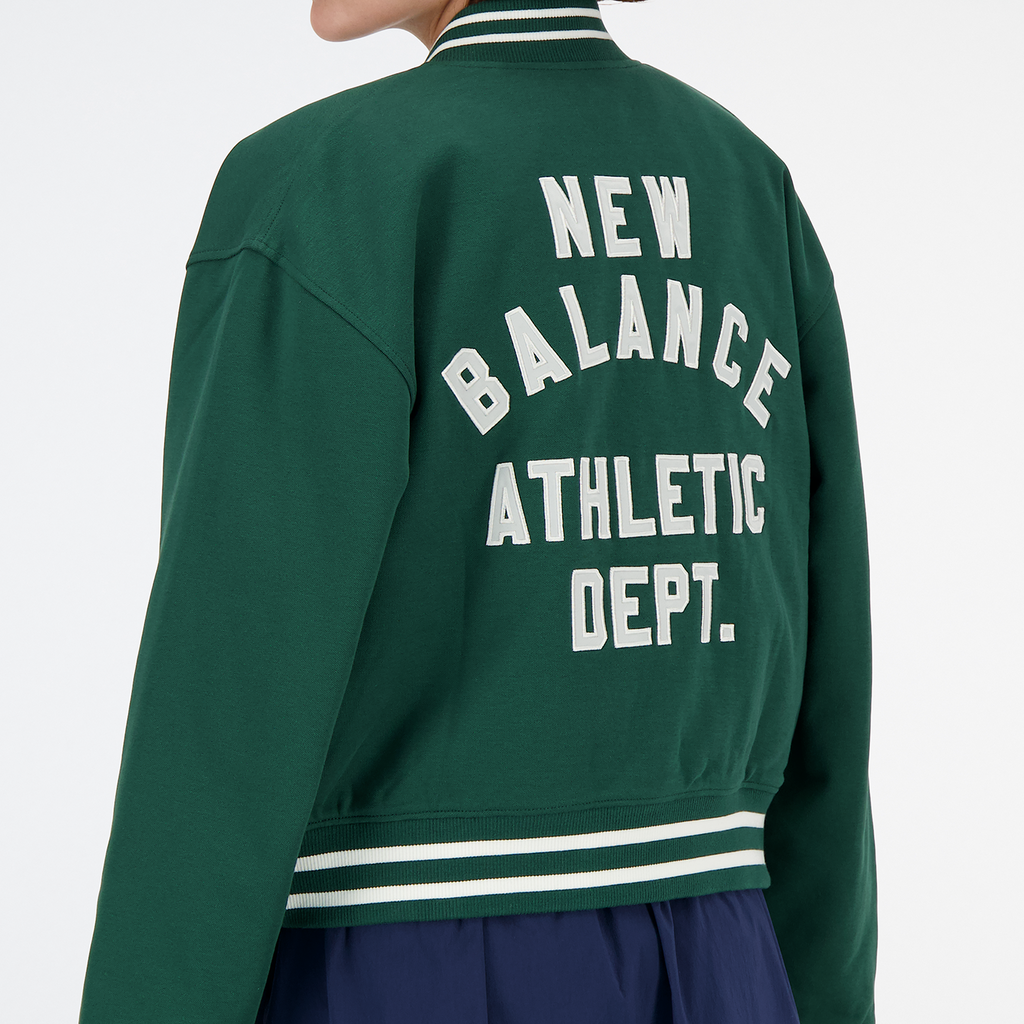 New Balance W Sportswear's Greatest Hits Interlock Varsity Jkt in GRÜN