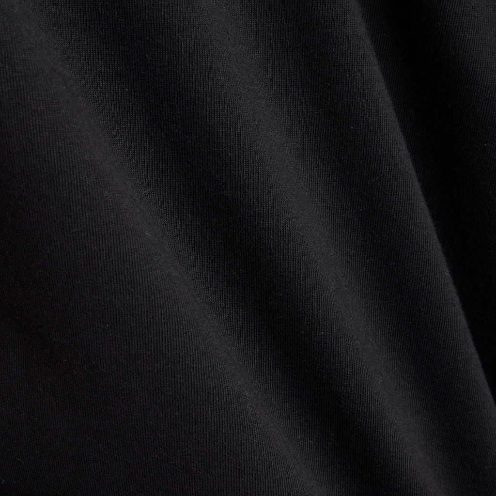 New Balance W Sport Jersey Relaxed Logo T-Shirt in SCHWARZ