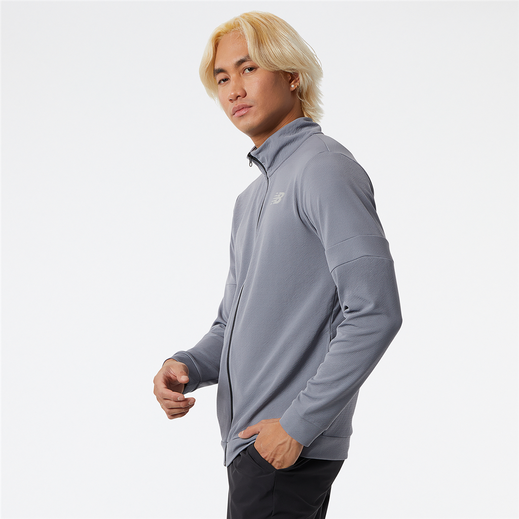 New Balance NB Tech Training Knit Track Jacket in GRAU