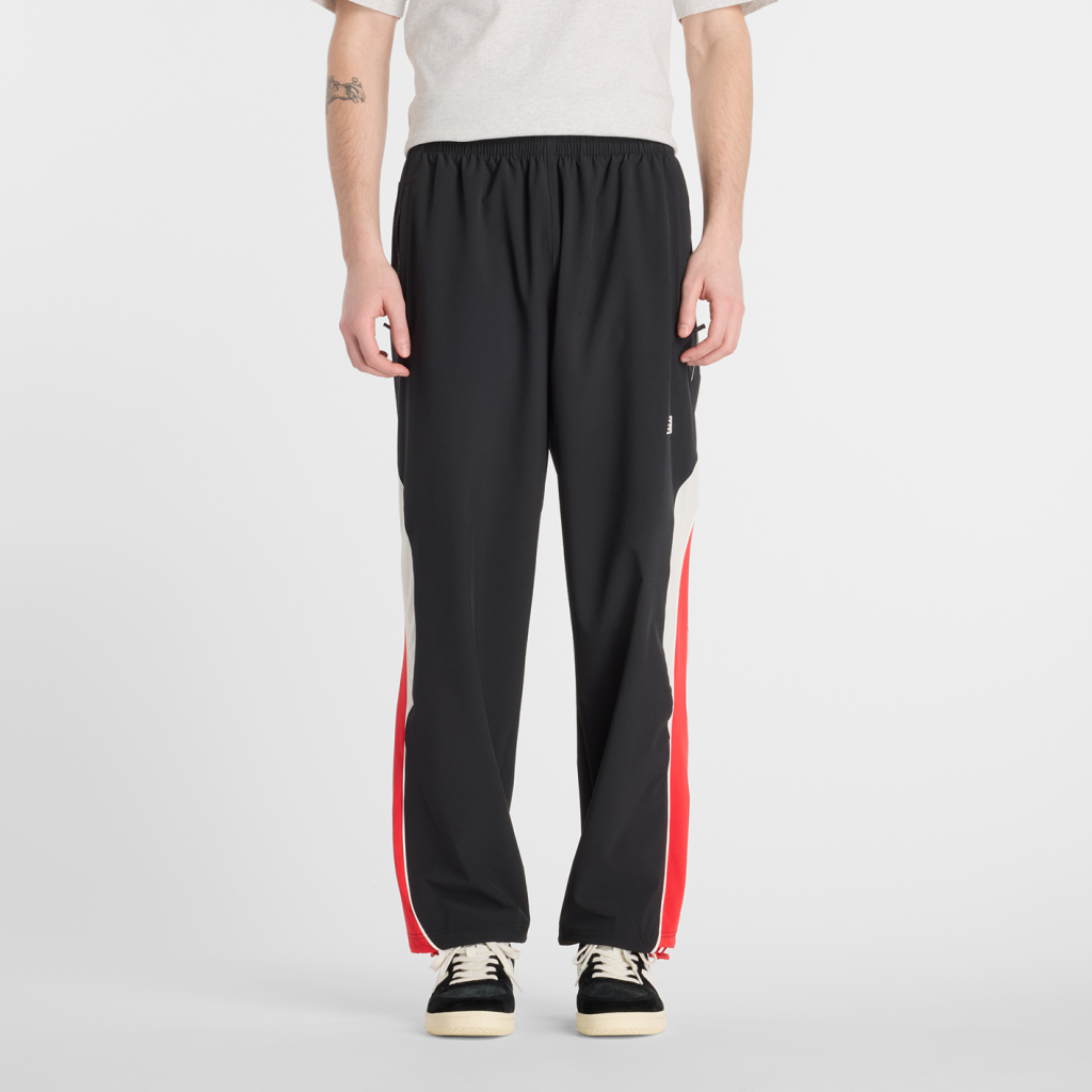 New Balance In Game Woven Track Pant in SCHWARZ