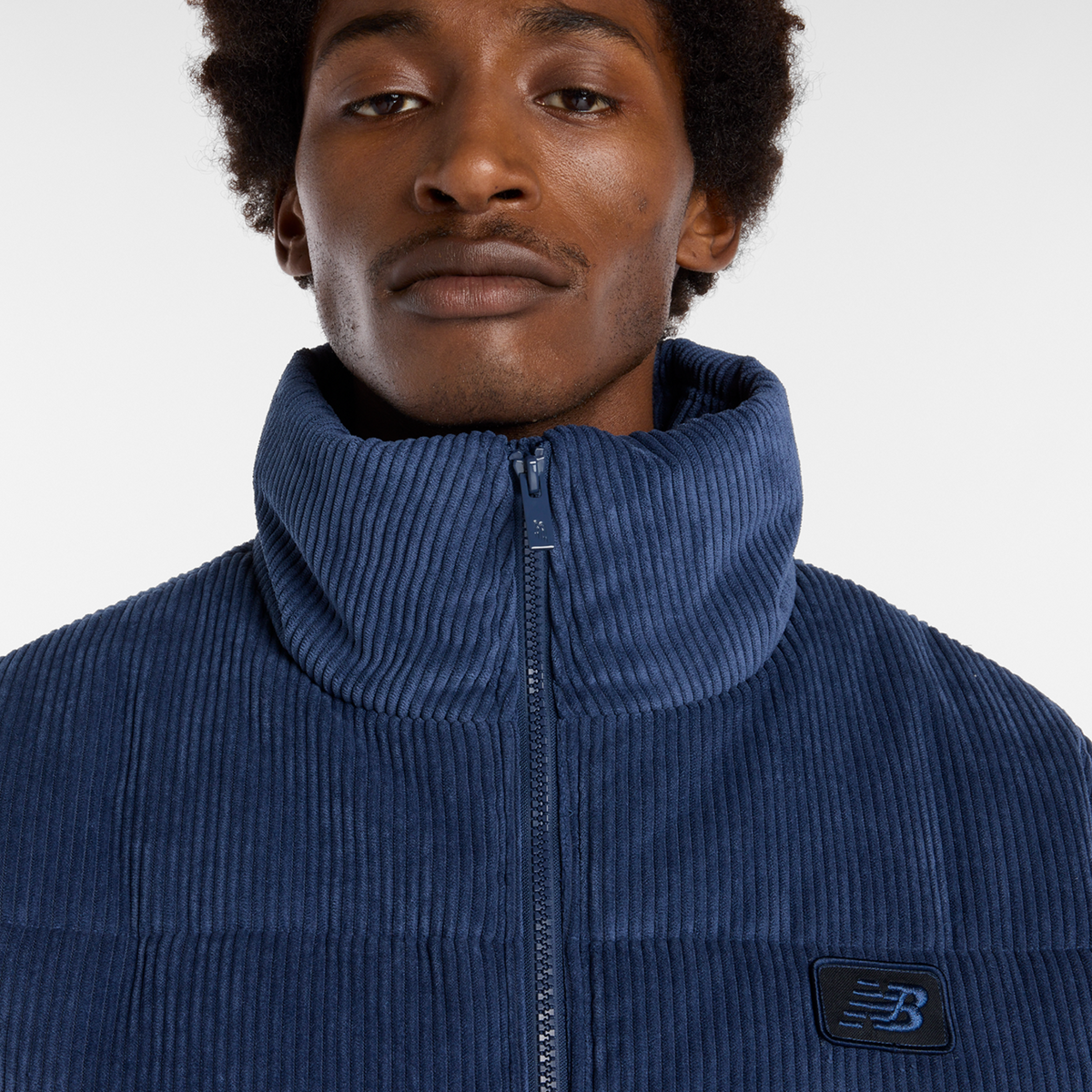 New Balance Corduroy Puffer Jacket in