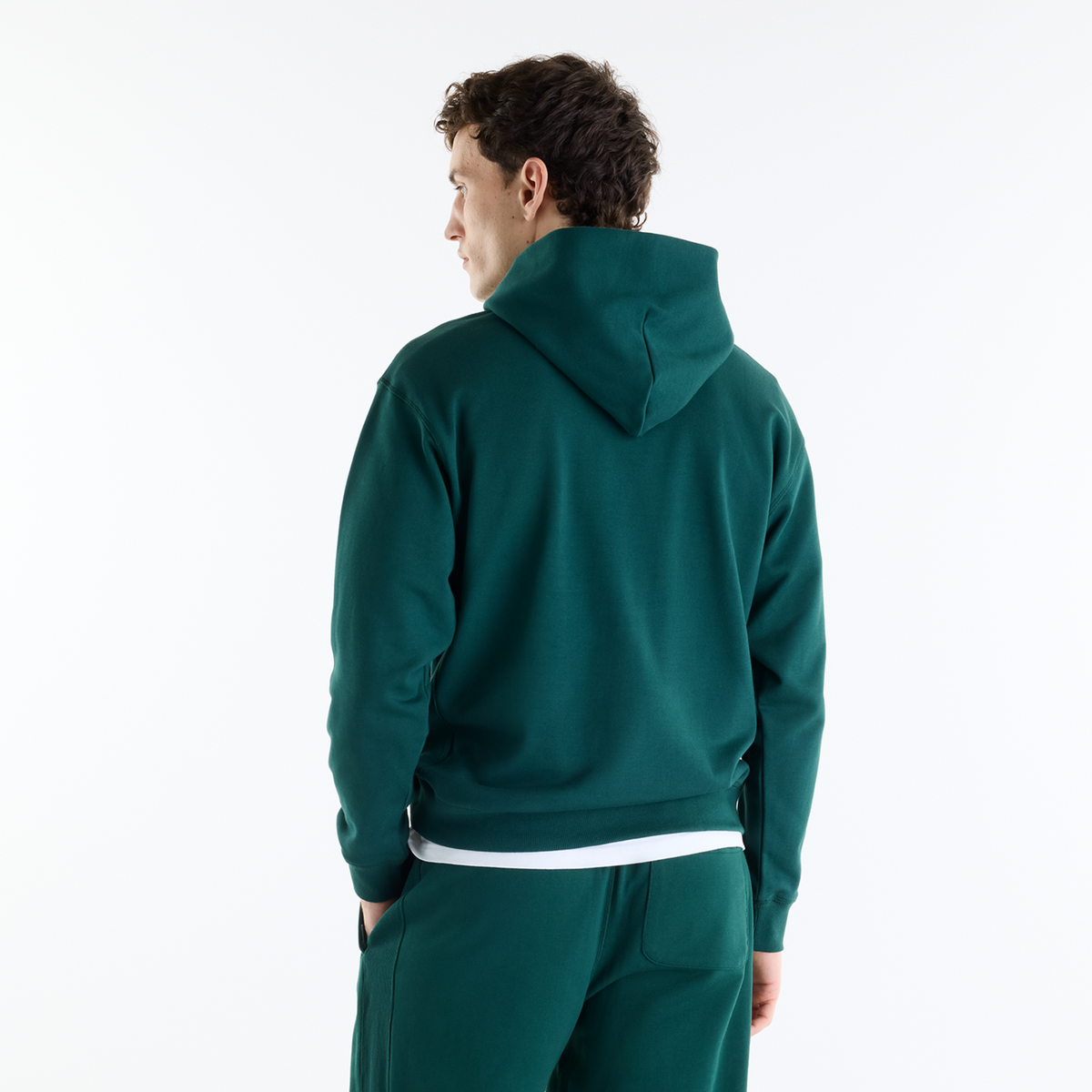 New Balance NB Athletics French Terry Hoodie in GRÜN