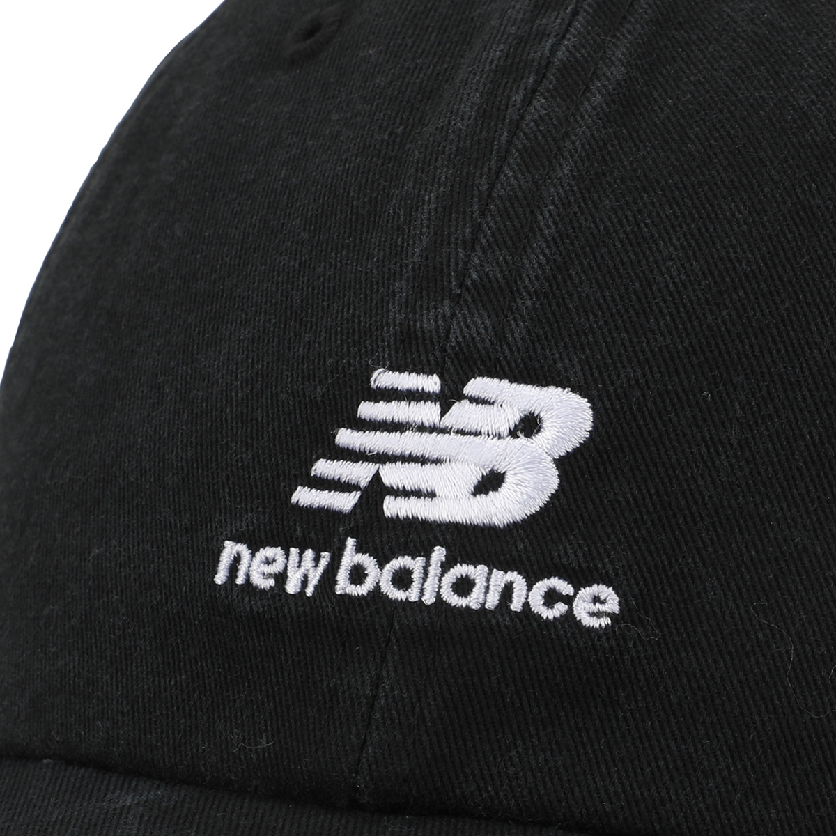 New Balance 6 Panel Flying NB Stacked Logo Hat in SCHWARZ