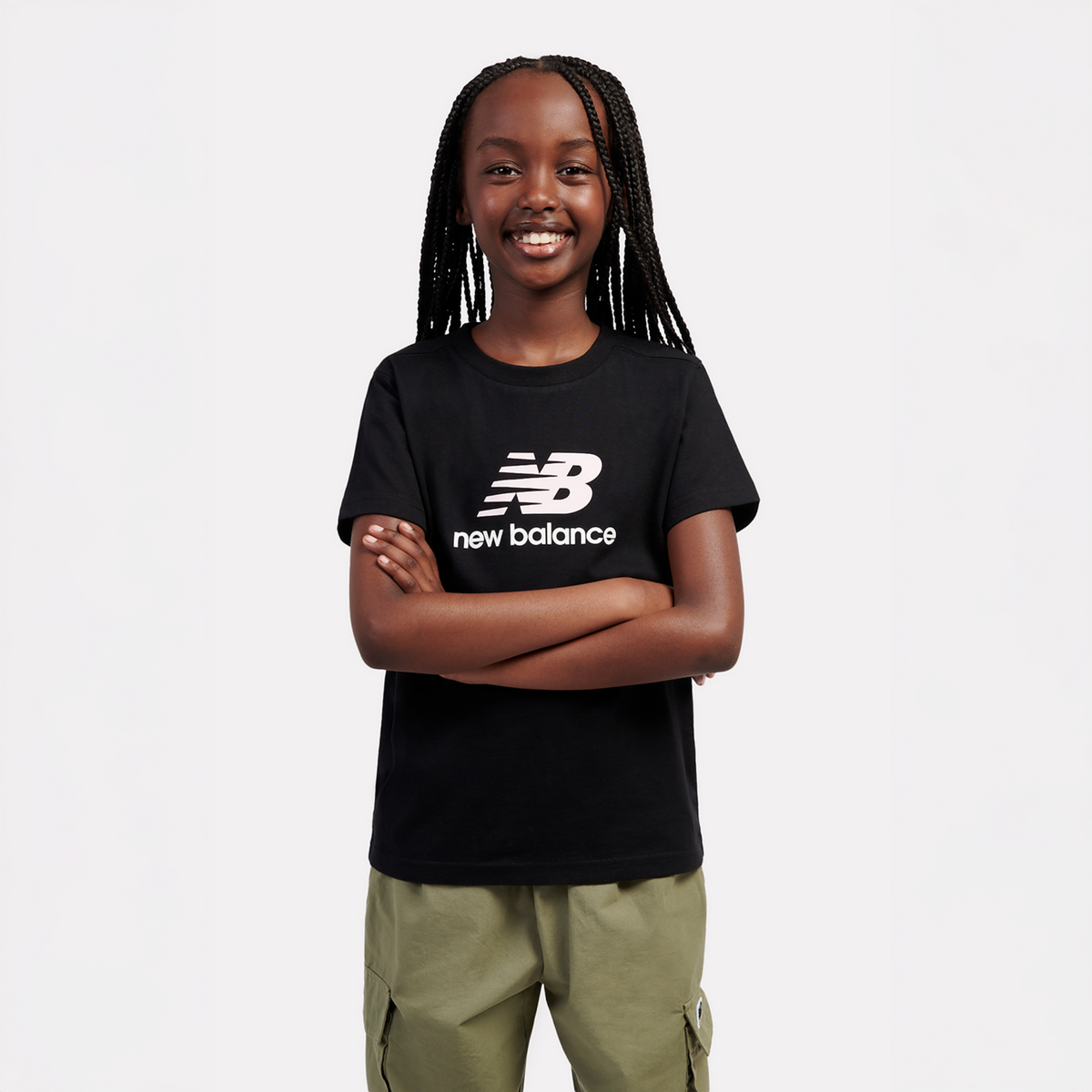 New Balance G NEW BALANCE JERSEY STACKED LOGO TEE in SCHWARZ