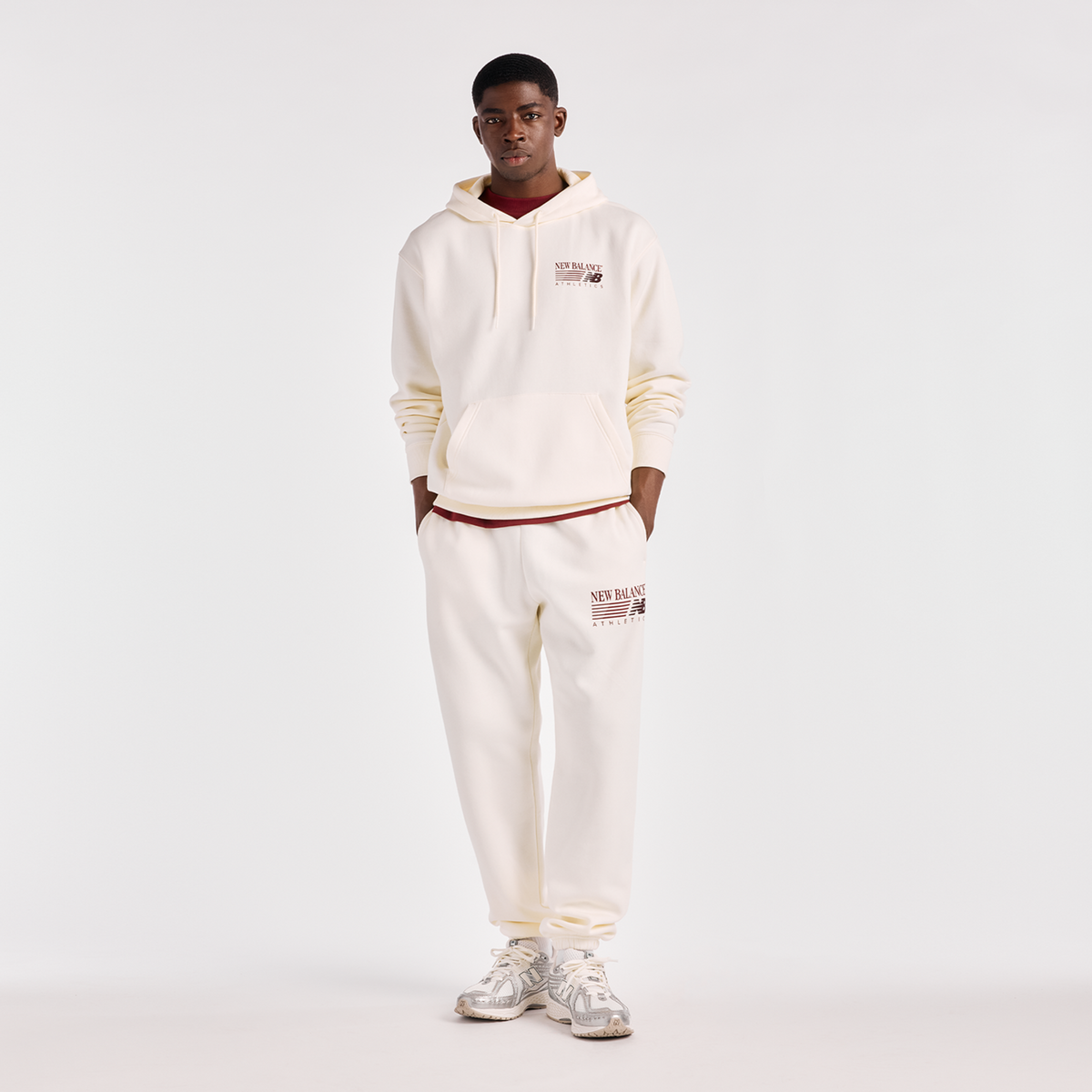 New Balance Reimagined Graphic Fleece Jogger in BEIGE