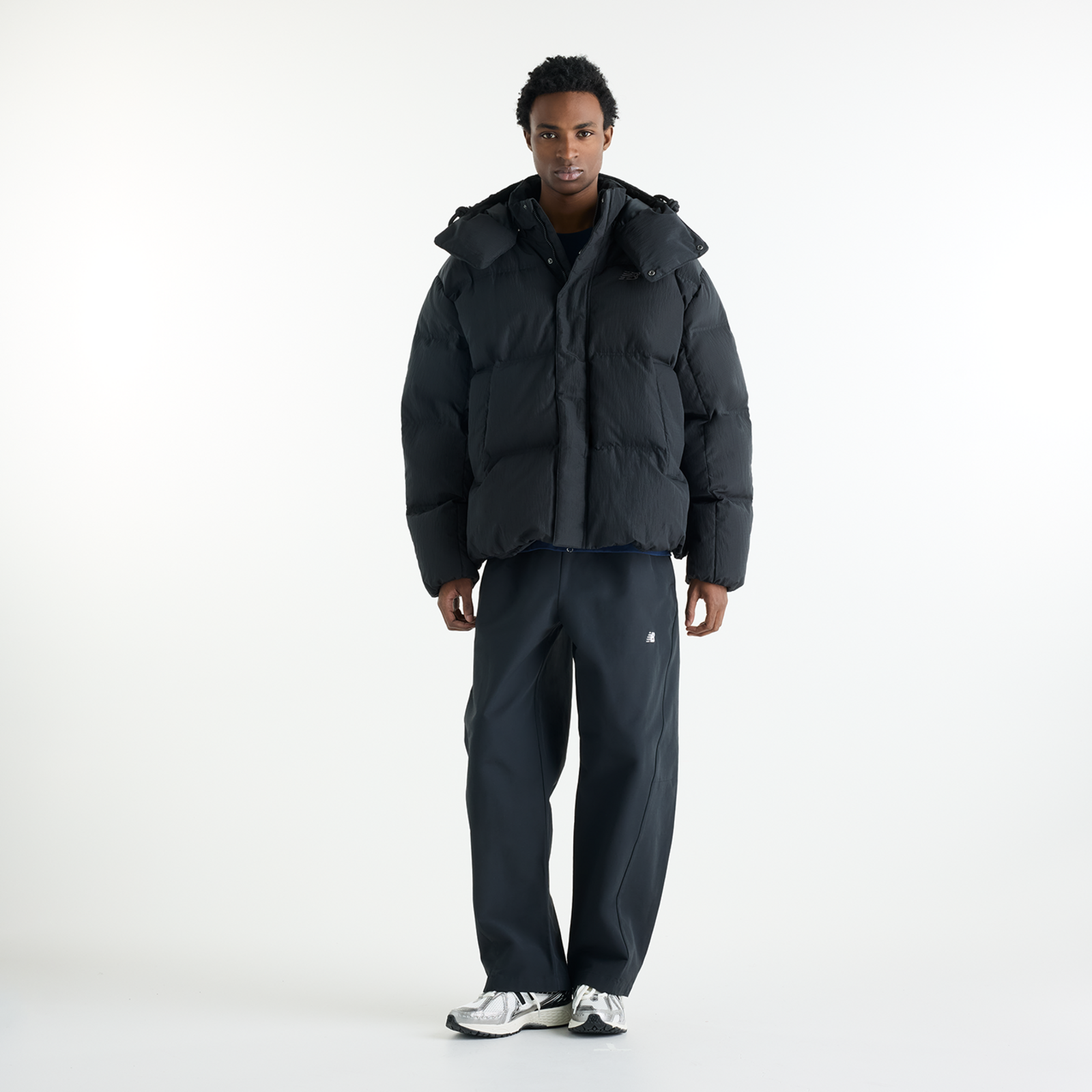 New Balance Premium Puffer Jacket in SCHWARZ