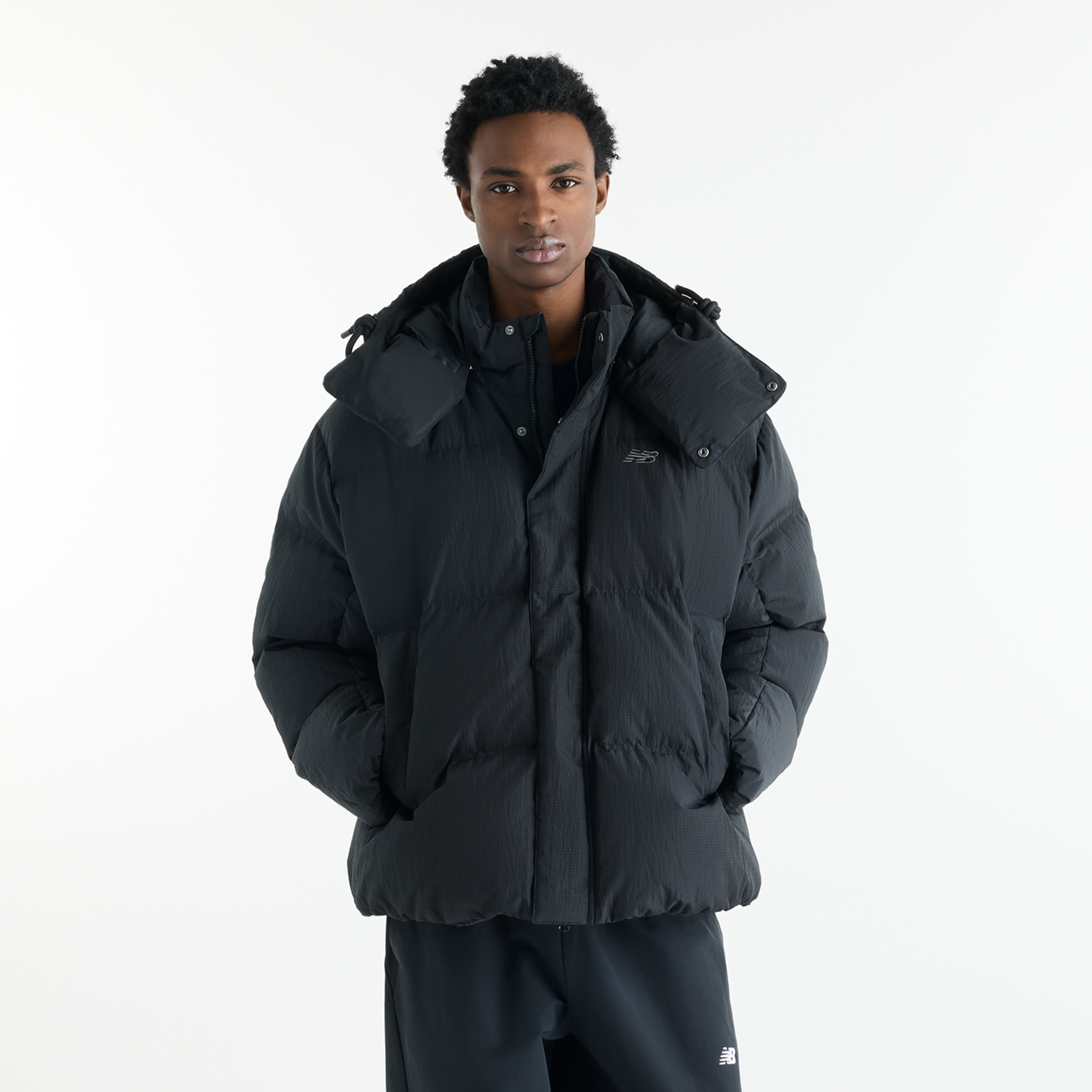 New Balance Premium Puffer Jacket in SCHWARZ