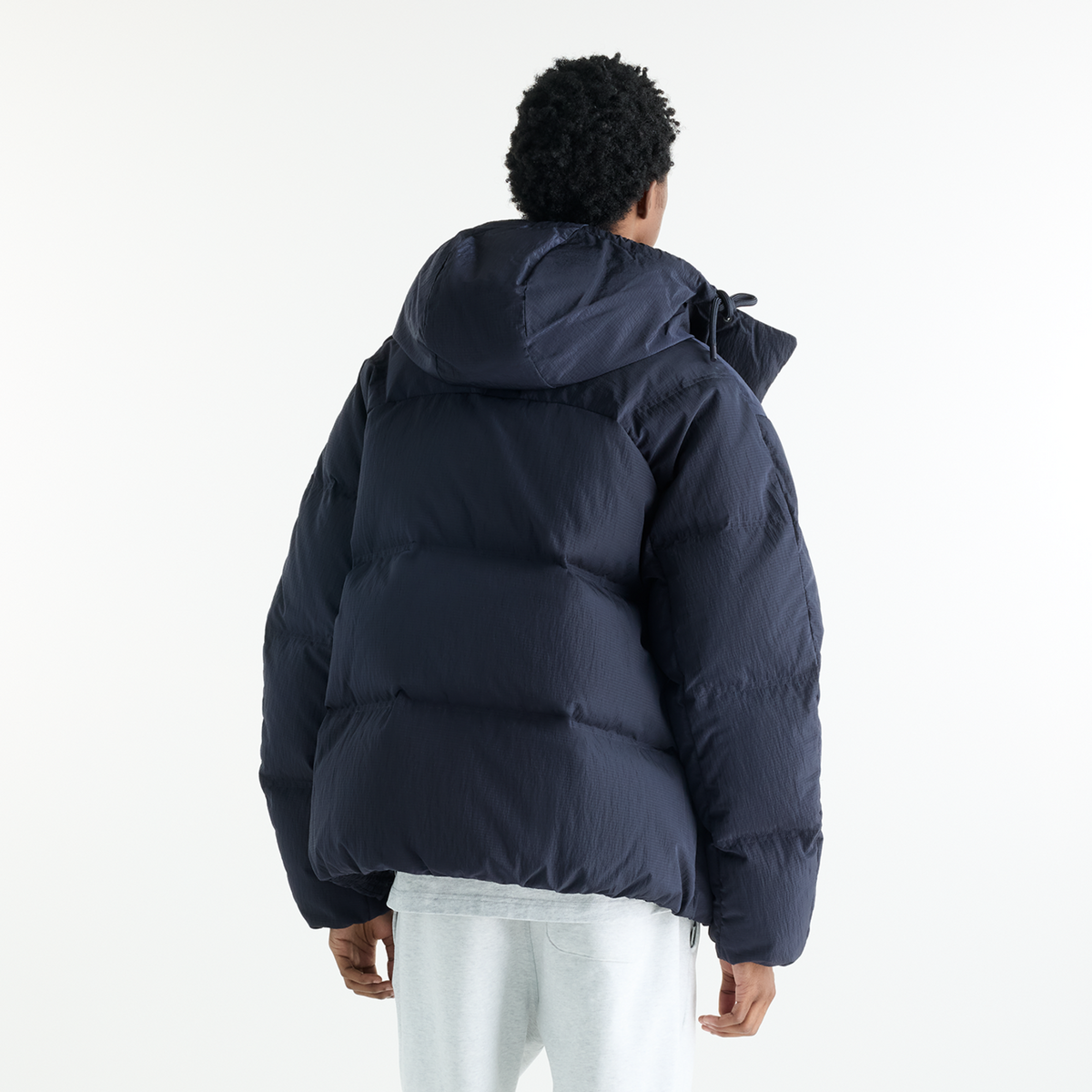 New Balance Premium Puffer Jacket in SCHWARZ