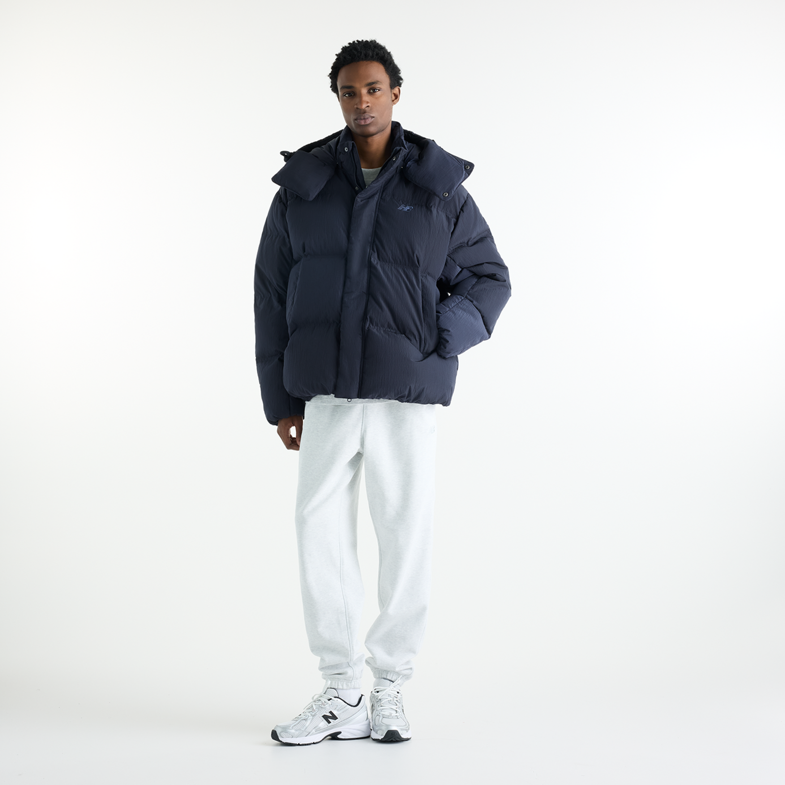 New Balance Premium Puffer Jacket in SCHWARZ