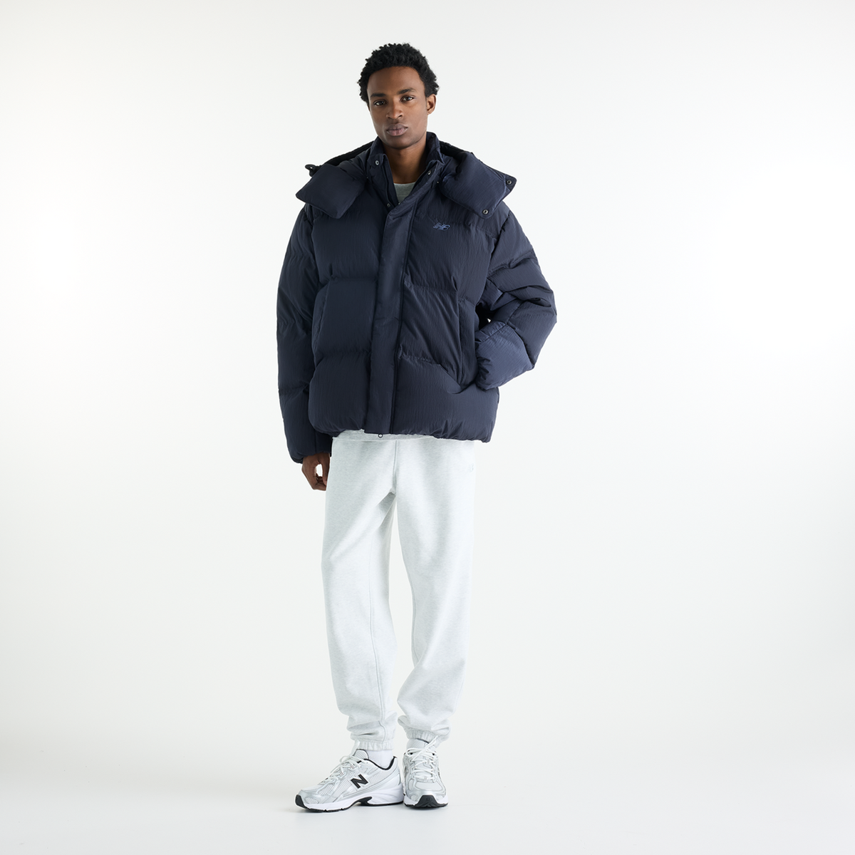 New Balance Premium Puffer Jacket in SCHWARZ