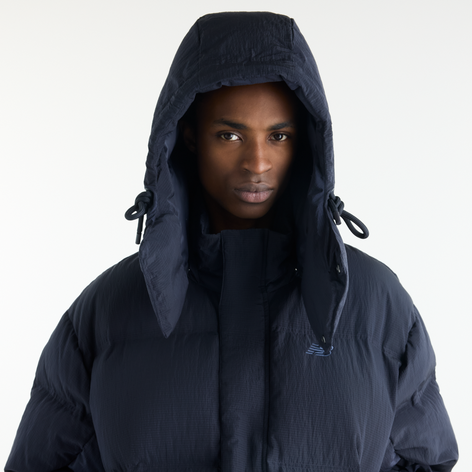 New Balance Premium Puffer Jacket in SCHWARZ