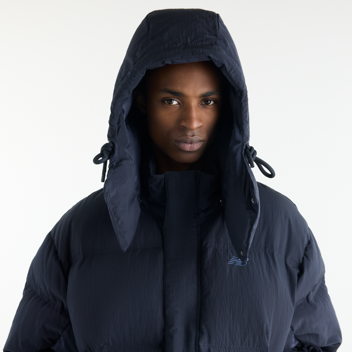 New Balance Premium Puffer Jacket in SCHWARZ