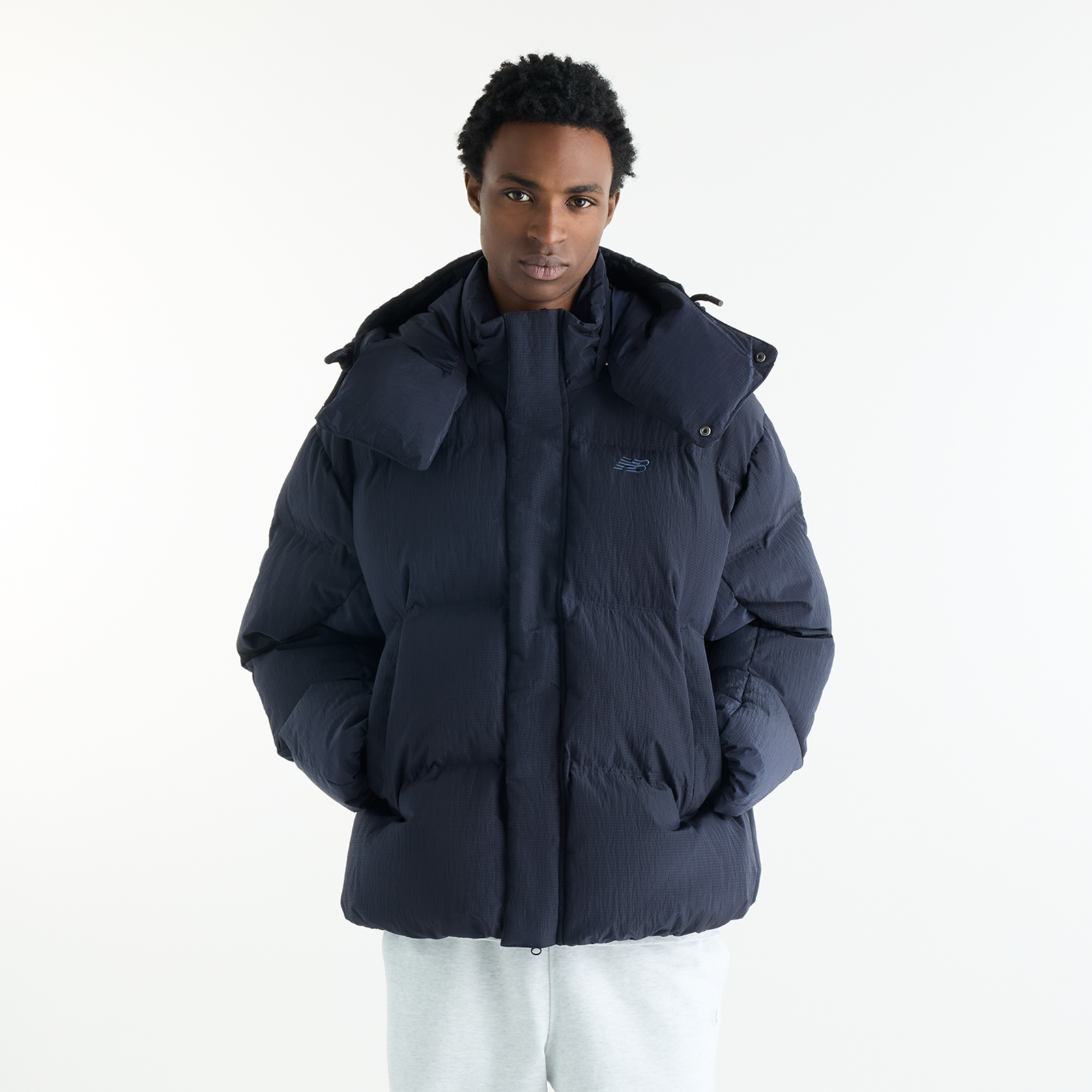 New Balance Premium Puffer Jacket in SCHWARZ