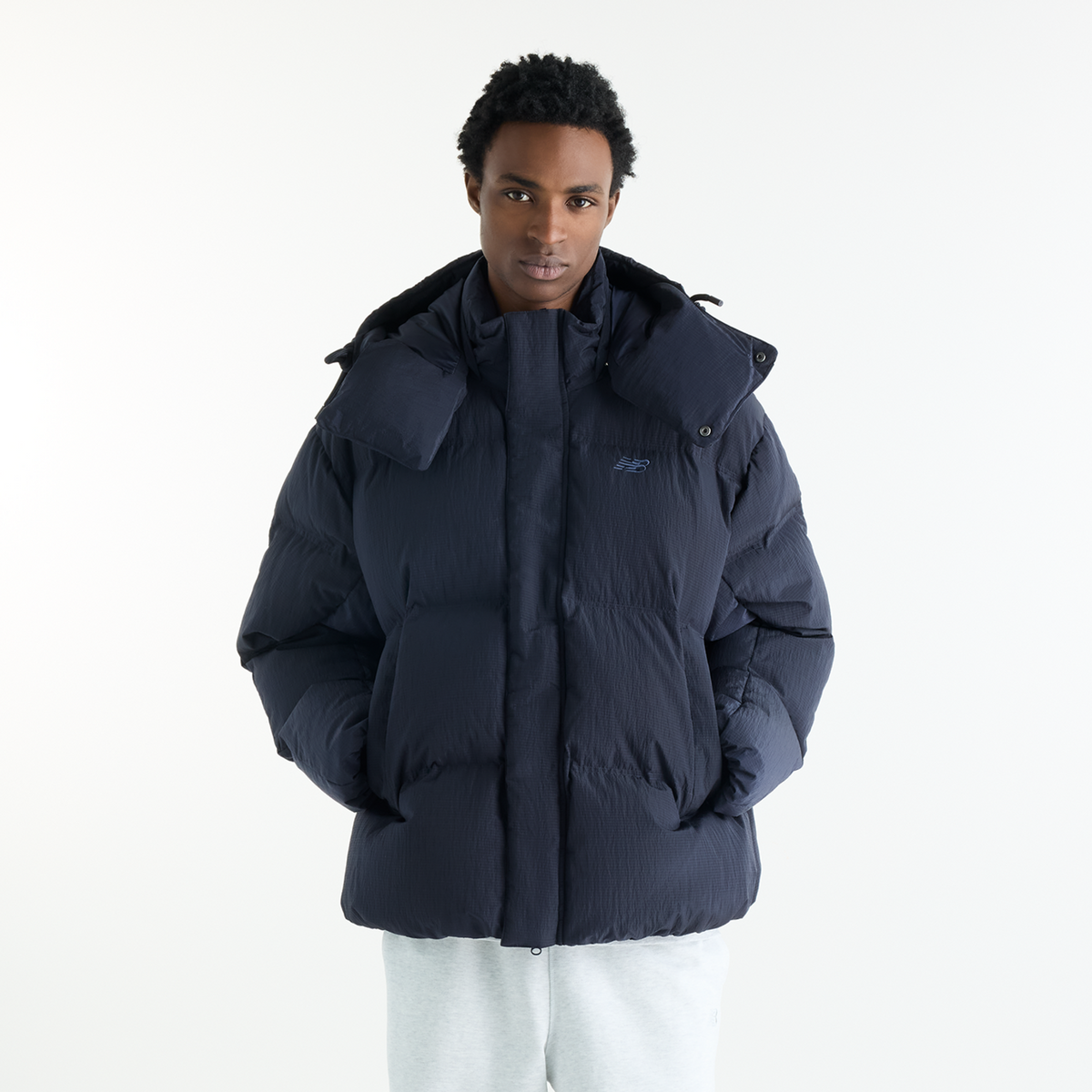 New Balance Premium Puffer Jacket in SCHWARZ