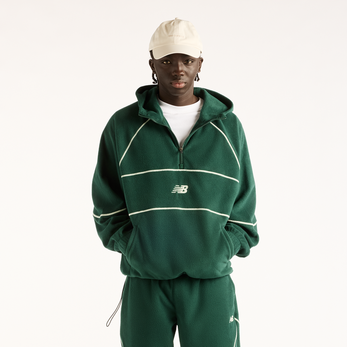 New Balance Trackside Polar Fleece Hoodie in GRÜN