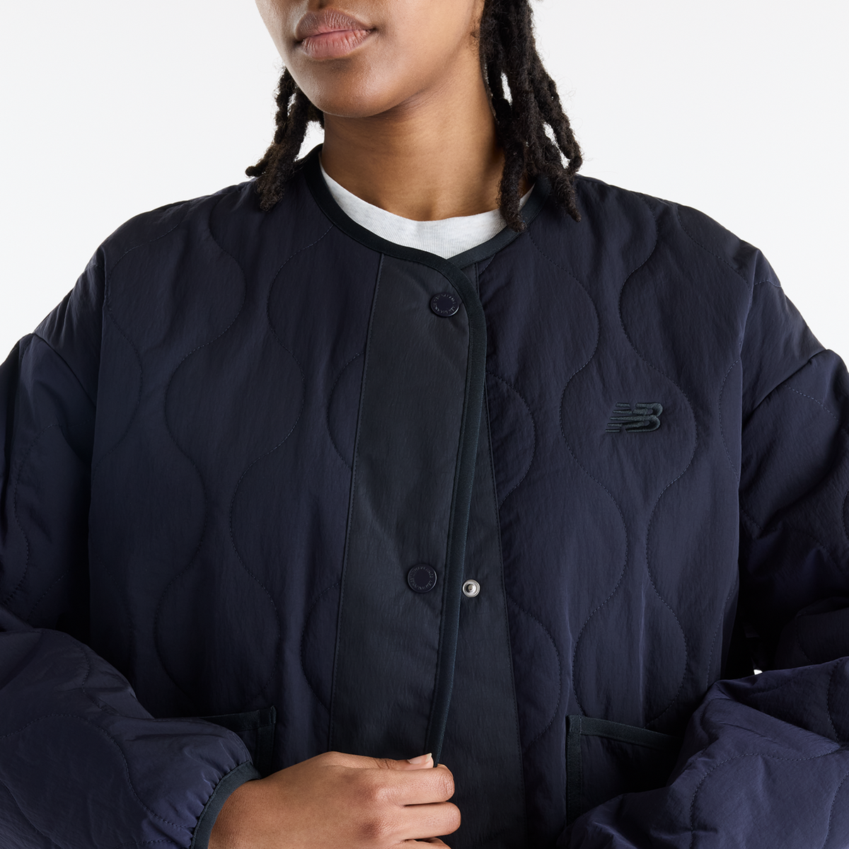 New Balance W Quilted Bomber in SCHWARZ