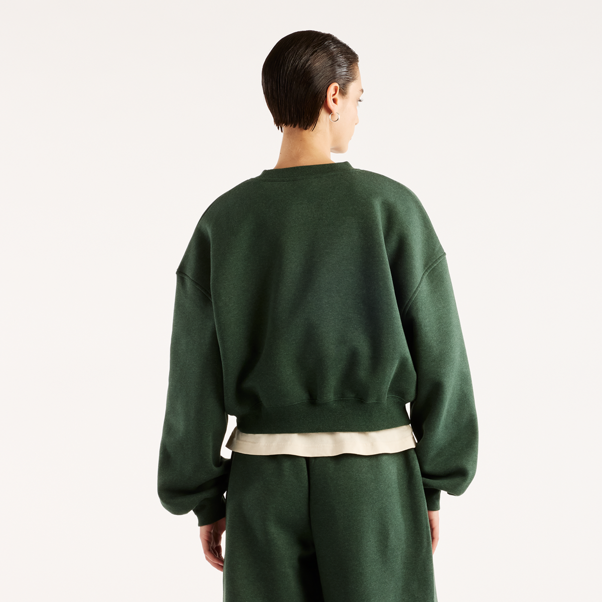 New Balance W Trackside Fleece Crew in GRÜN