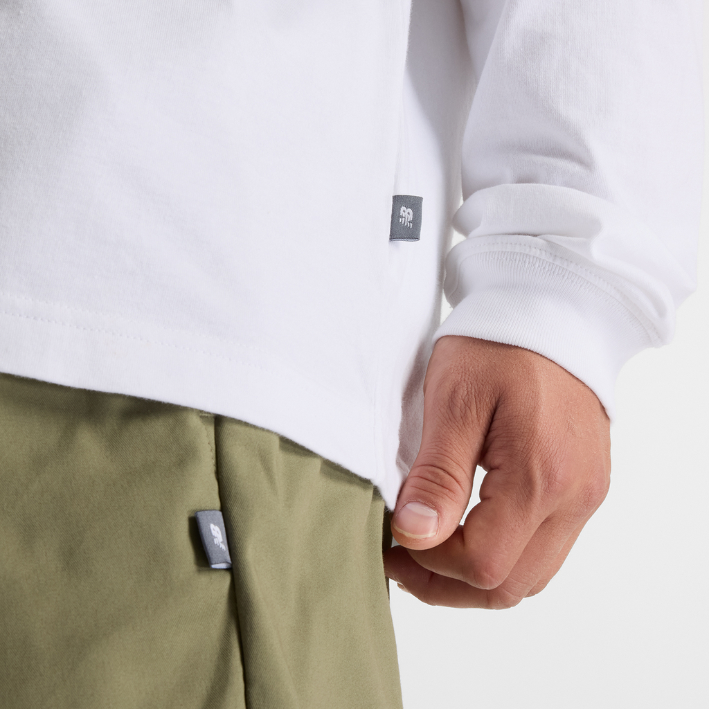 New Balance Relaxed Linear Athletics Long Sleeve in WEISS