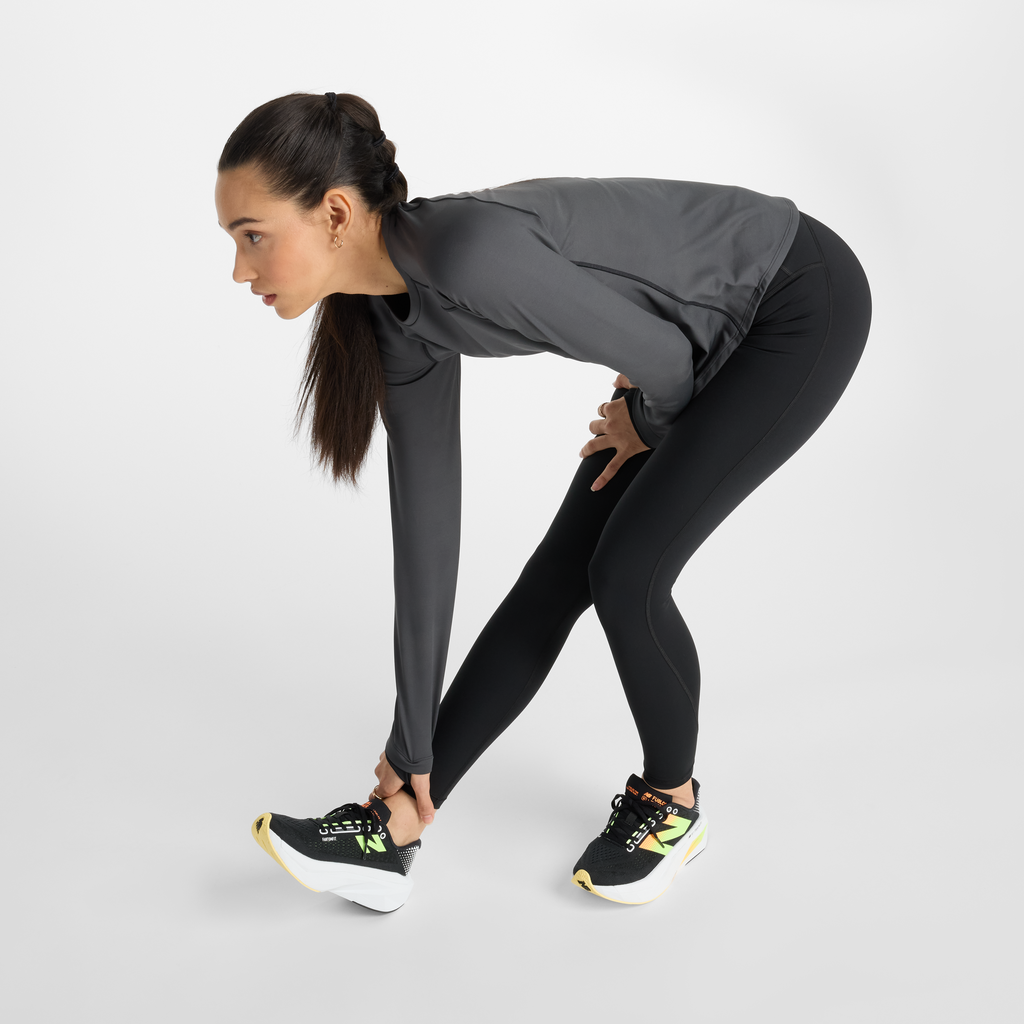 New Balance W Athletics Heat High Rise Legging 27" in SCHWARZ