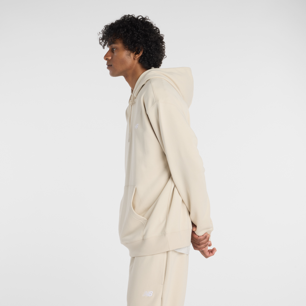 New Balance Sport Essentials Small Logo French Terry Hoodie in BEIGE