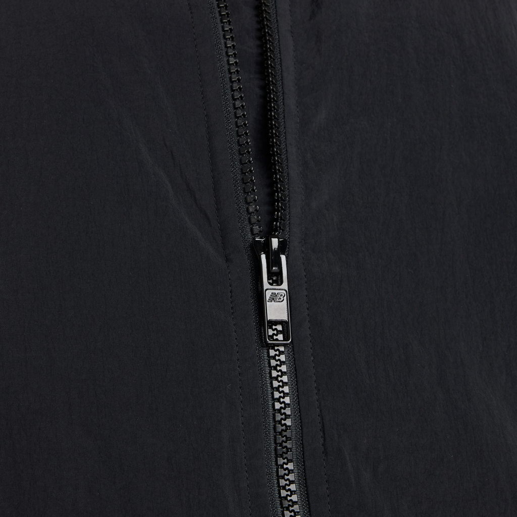 New Balance W Linear Heritage Woven Bomber Jacket in SCHWARZ