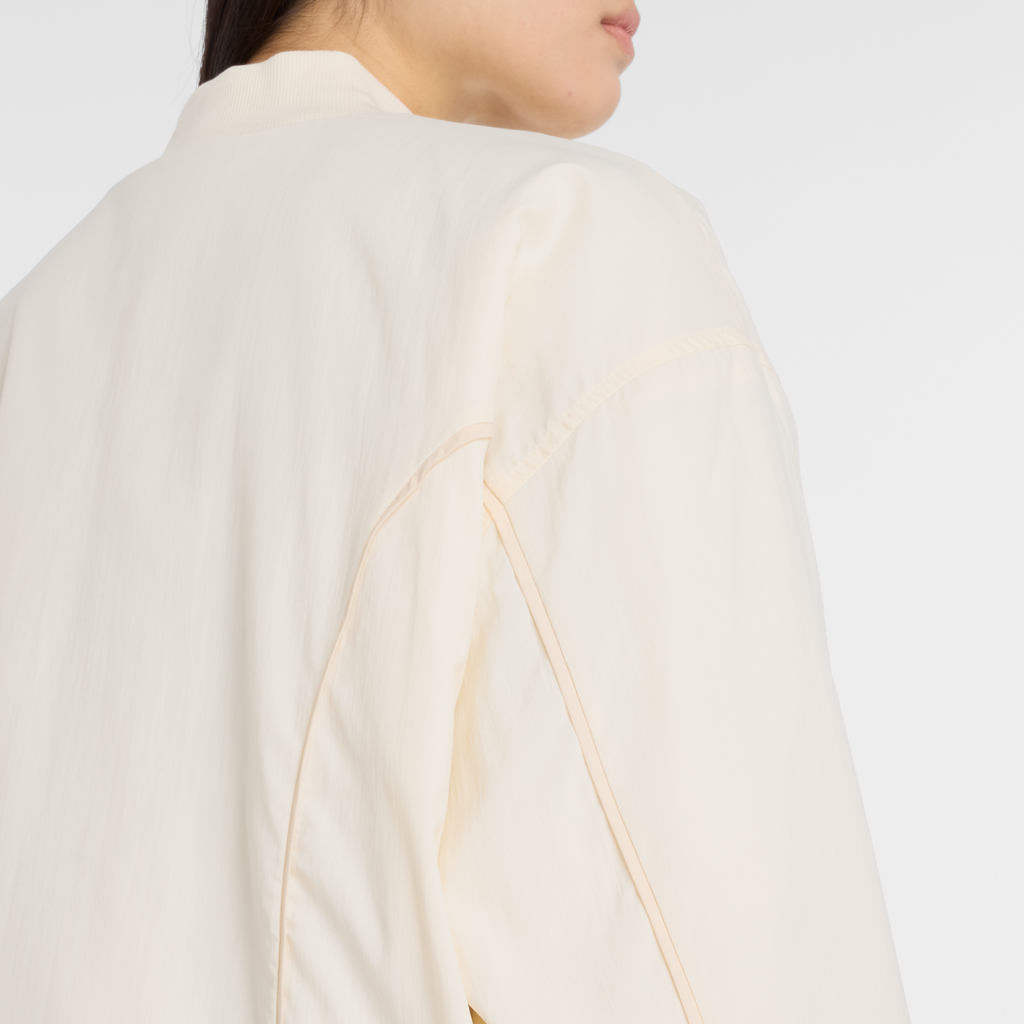 New Balance W Linear Heritage Woven Bomber Jacket in GRAU