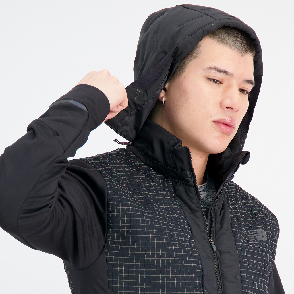 New Balance Impact Run Luminous Heat Jacket in SCHWARZ