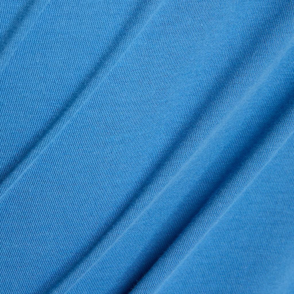 New Balance Relaxed Linear Athletics Long Sleeve in BLAU