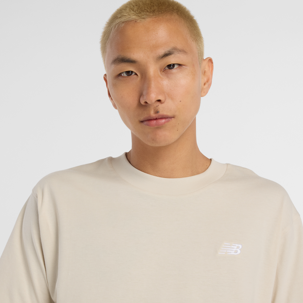 New Balance Sport Essentials Small Logo T-Shirt in BEIGE