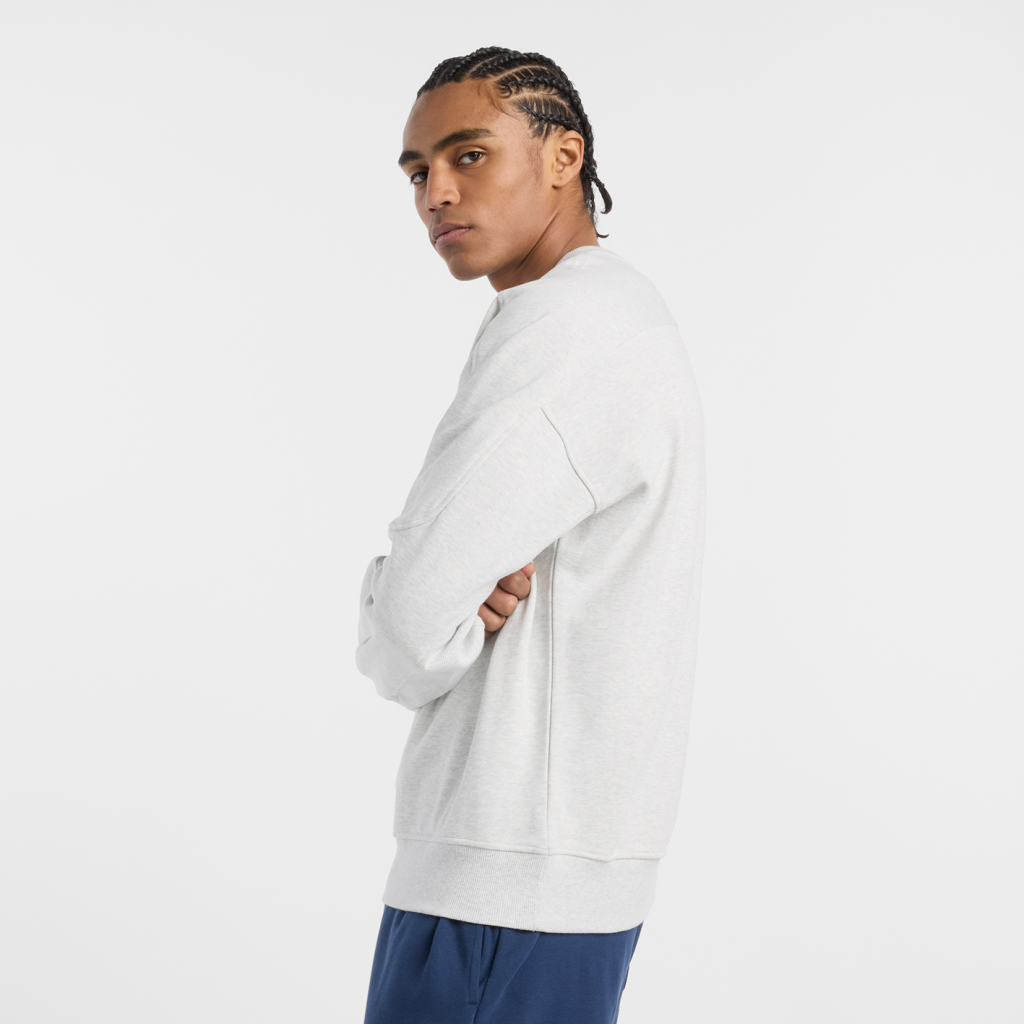 New Balance Varsity French Terry Graphic Crew in GRAU