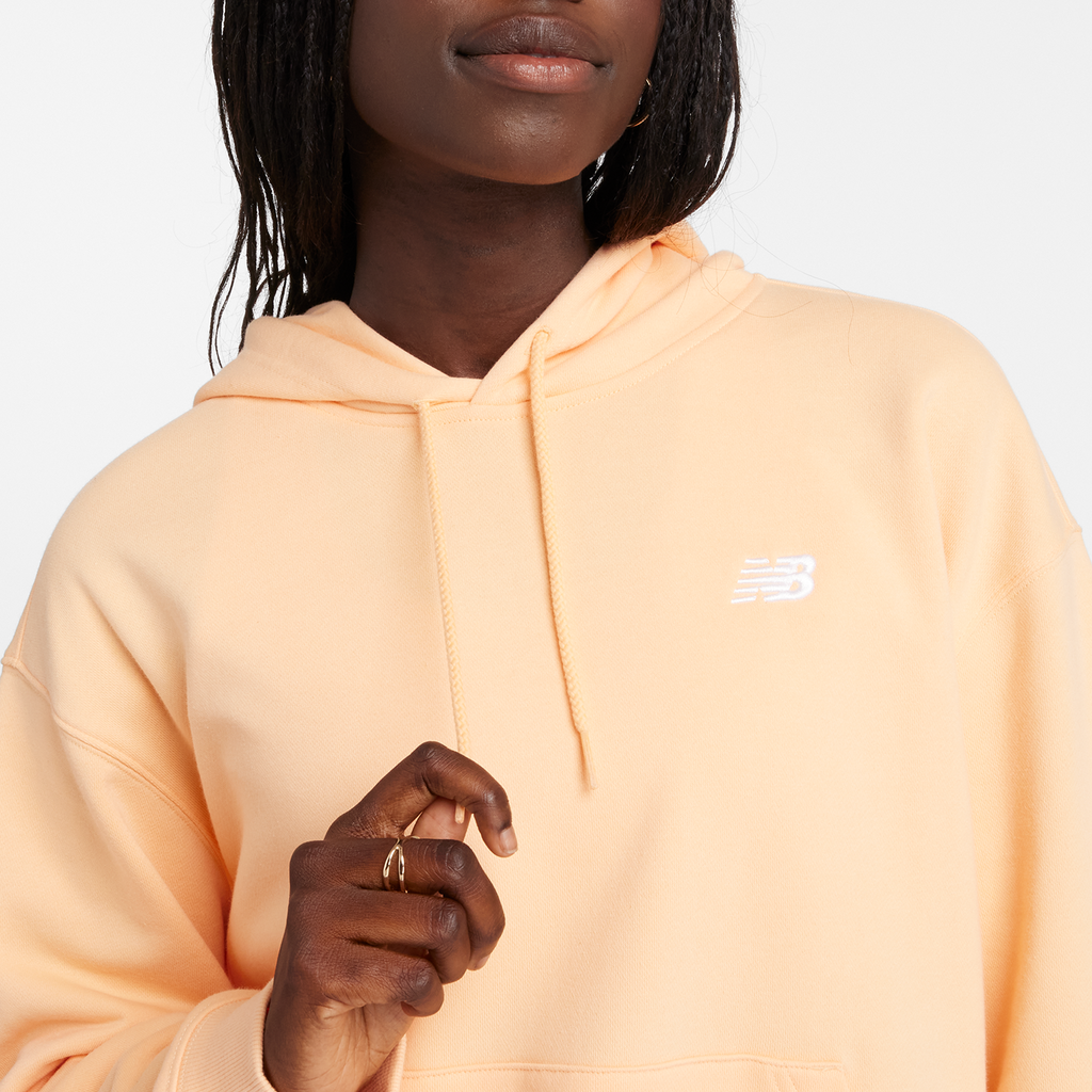 New Balance W Sport Essentials French Terry Small Logo Hoodie in ORANGE