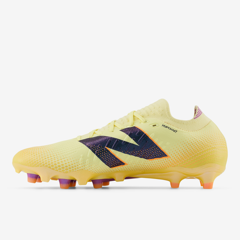 New Balance M Tekela Pro FG Seasonal Nockenschuhe in ORANGE