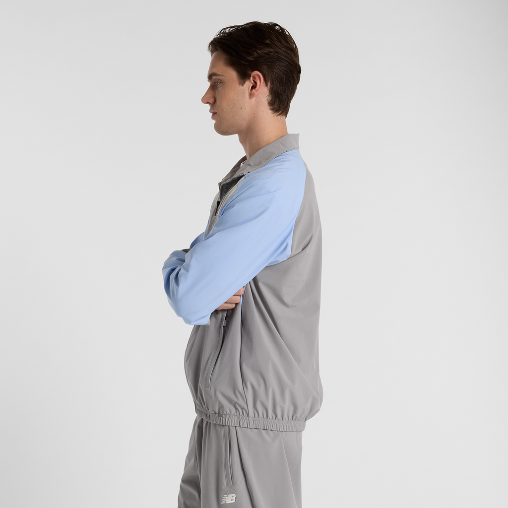 New Balance Woven Track Jacket in GRAU