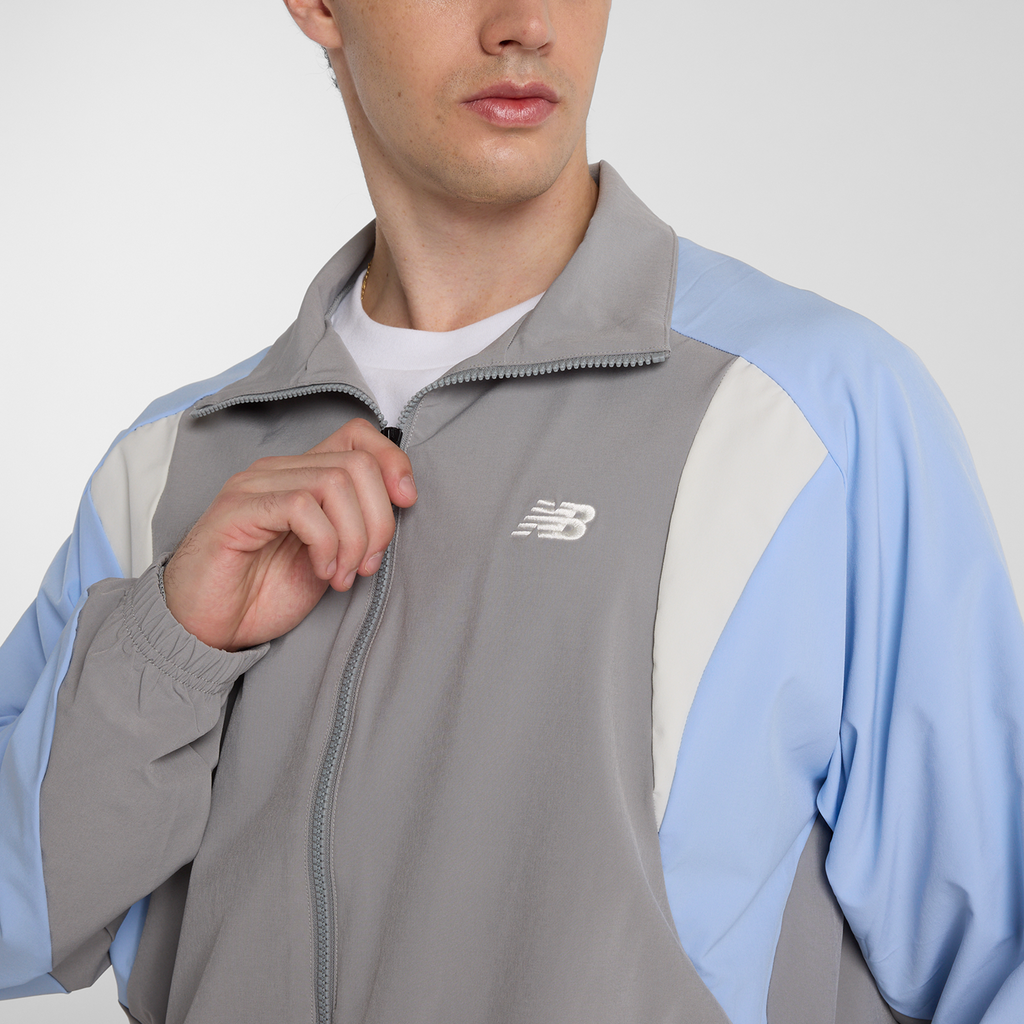 New Balance Woven Track Jacket in GRAU