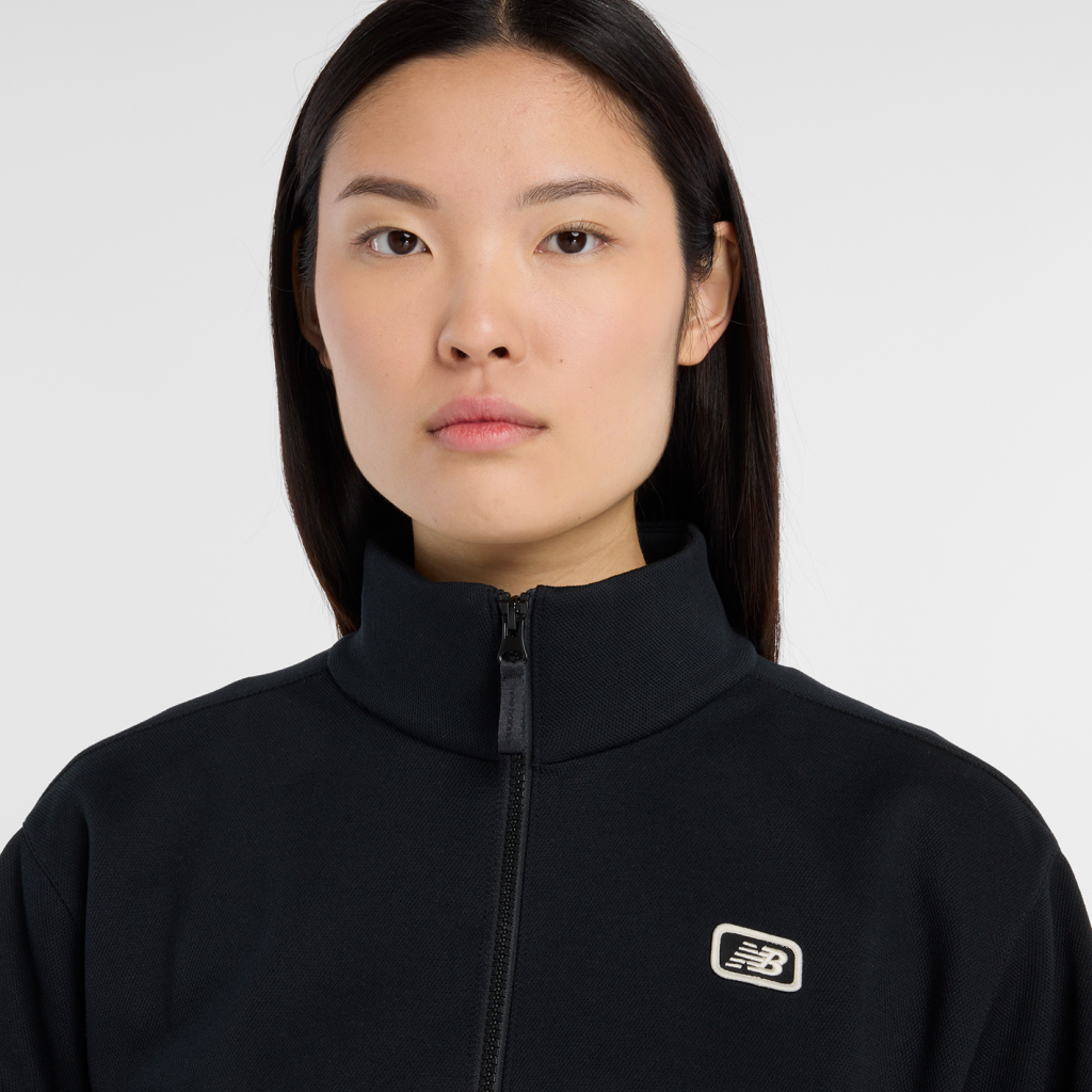 New Balance W Post Season Pique Track Jacket in SCHWARZ