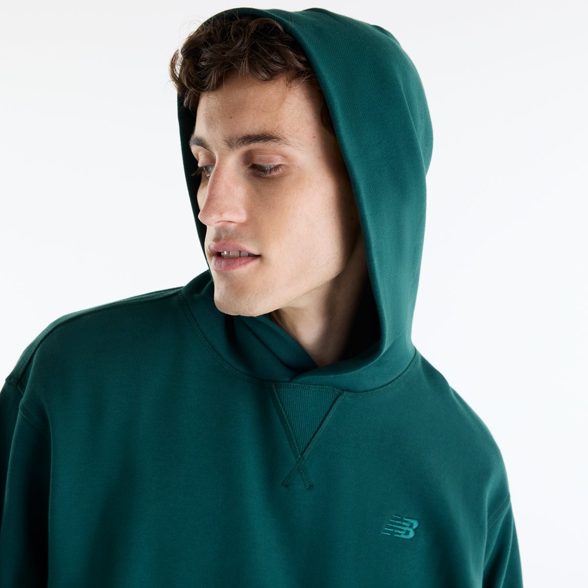 New Balance NB Athletics French Terry Hoodie in GRÜN