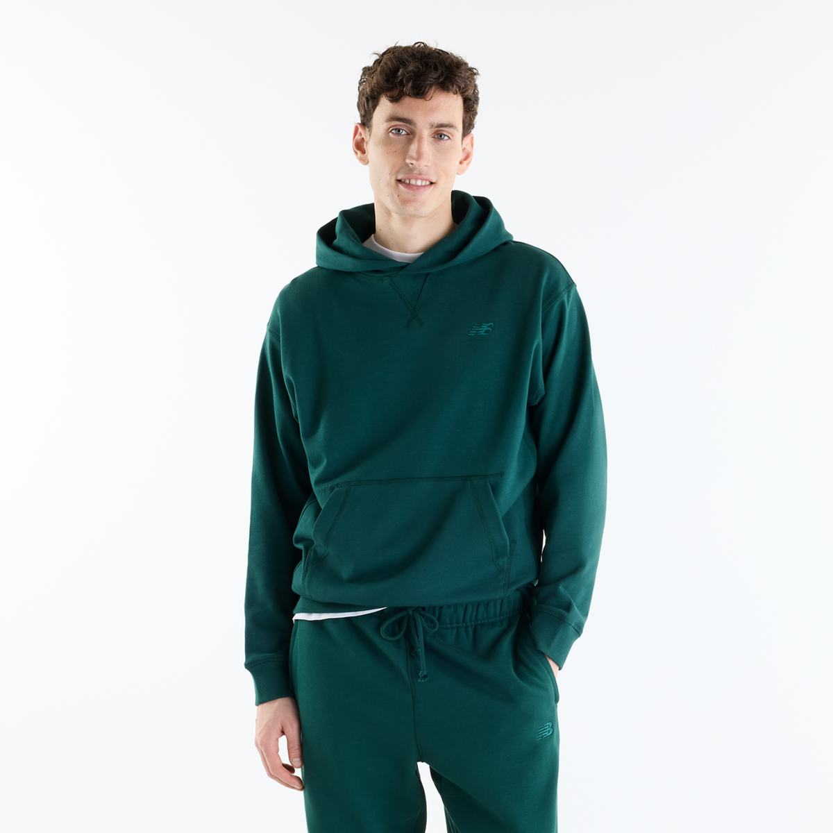 New Balance NB Athletics French Terry Hoodie in GRÜN
