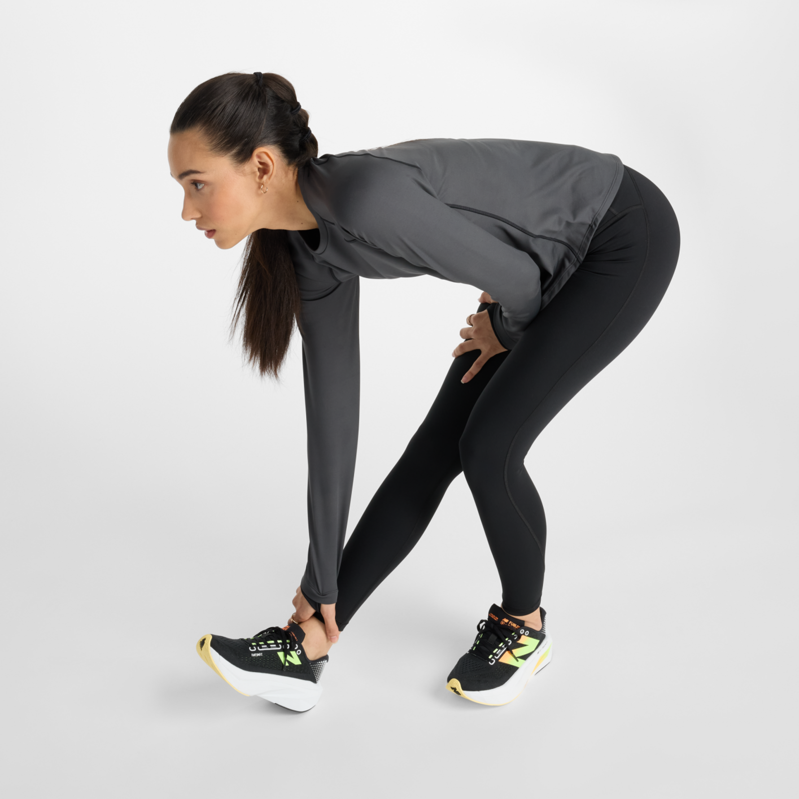 New Balance W Athletics Heat High Rise Legging 27" in