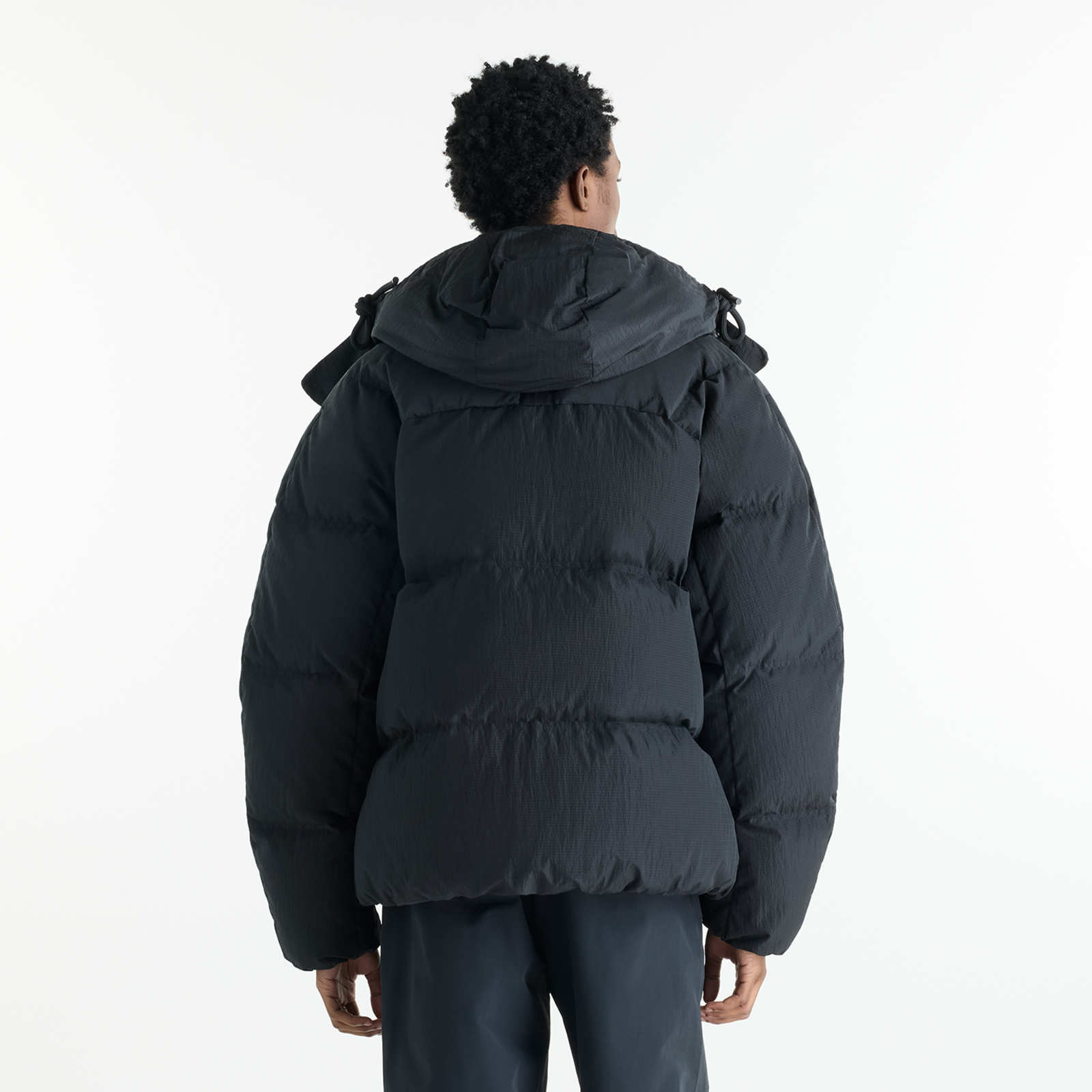 New Balance Premium Puffer Jacket in SCHWARZ