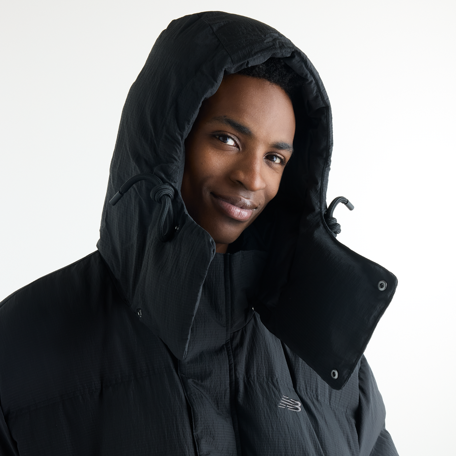 New Balance Premium Puffer Jacket in SCHWARZ