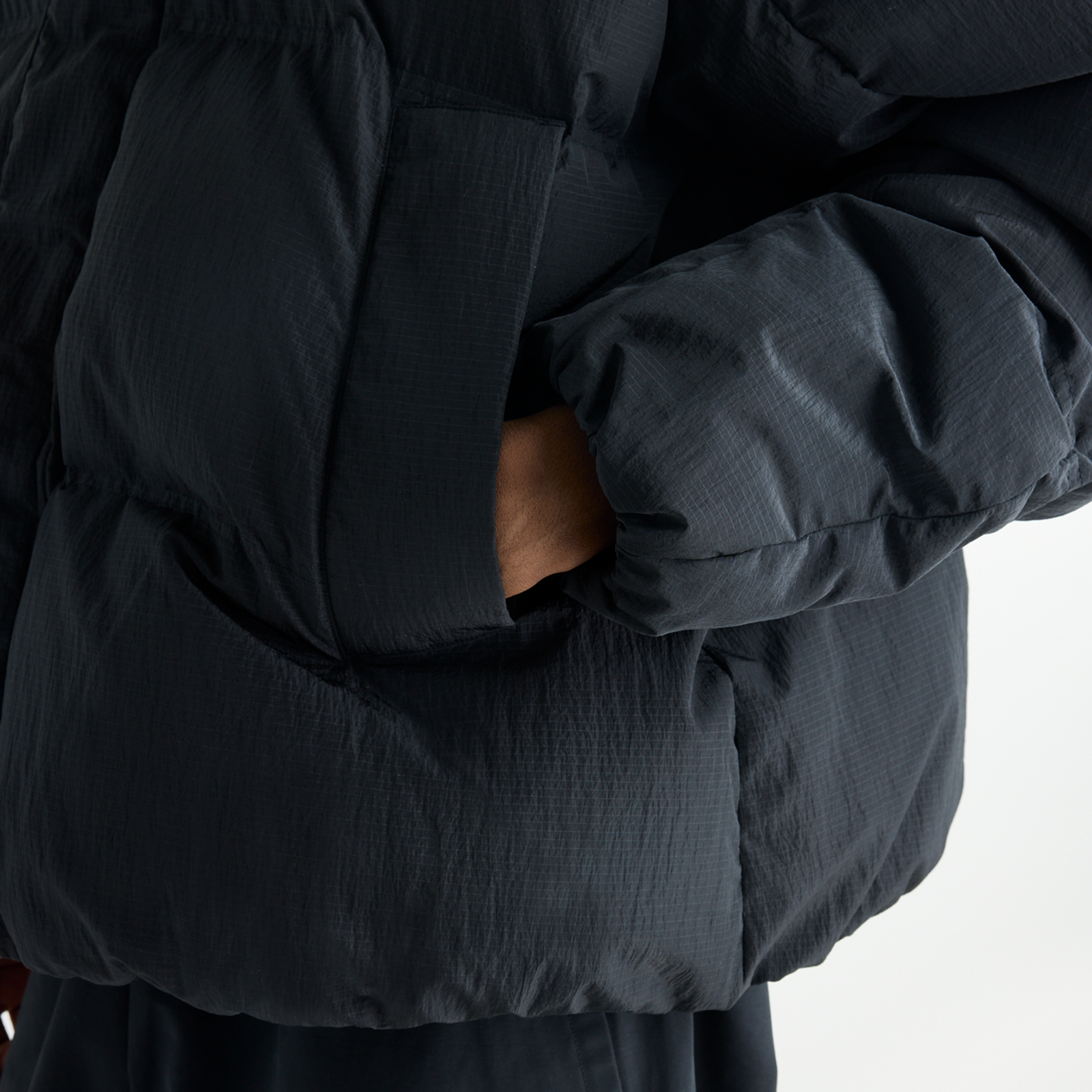 New Balance Premium Puffer Jacket in SCHWARZ