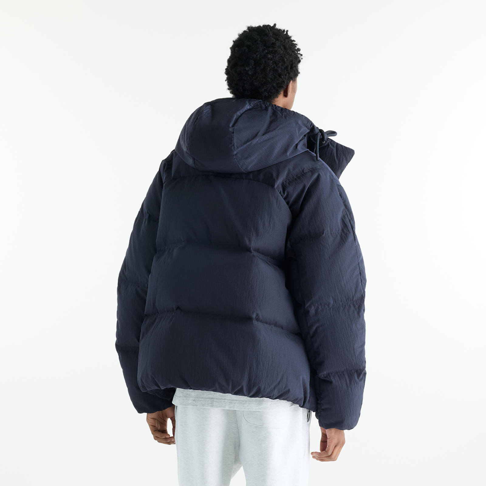 New Balance Premium Puffer Jacket in SCHWARZ