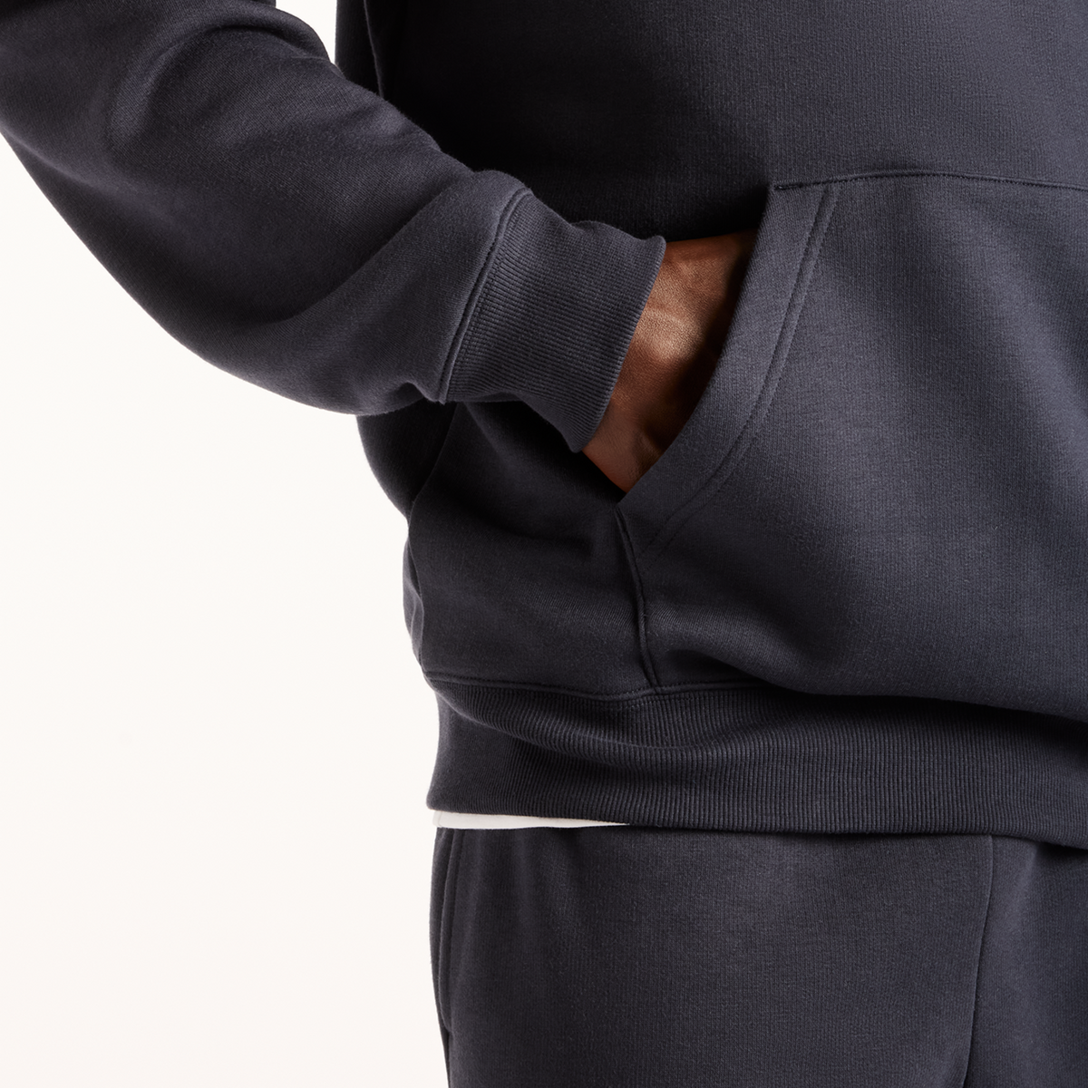 New Balance Reimagined Fleece Hoodie in SCHWARZ