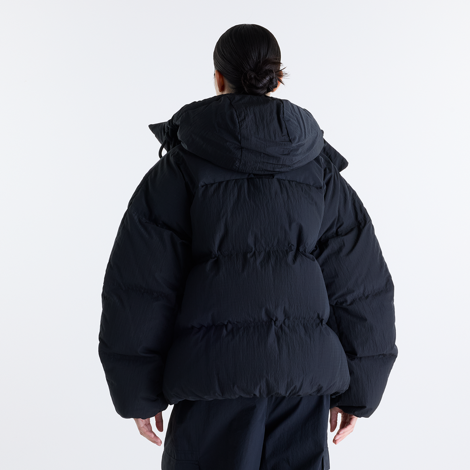 New Balance W Premium Puffer Jacket in SCHWARZ