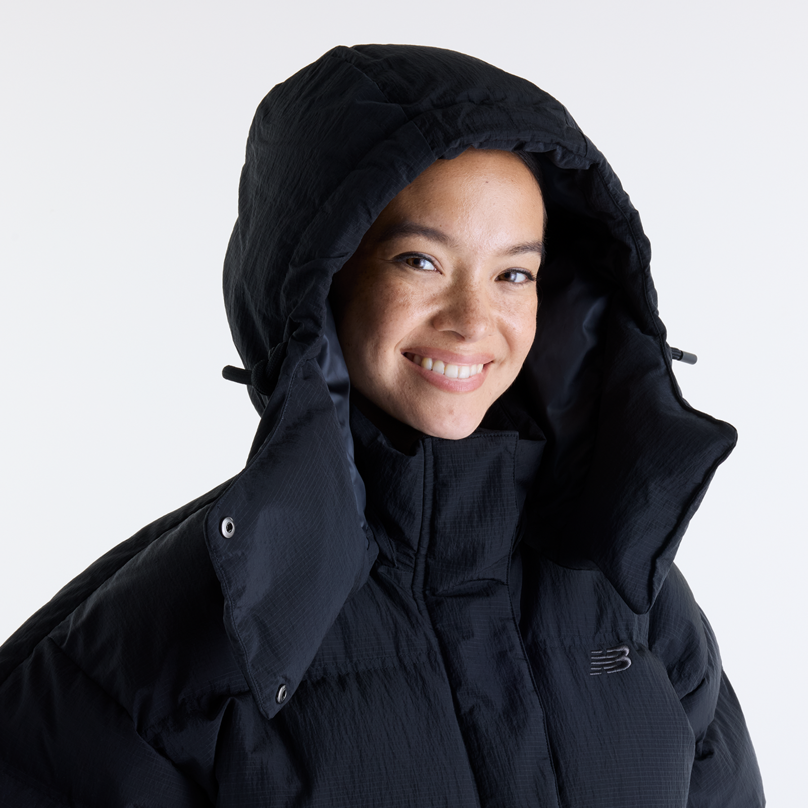 New Balance W Premium Puffer Jacket in SCHWARZ