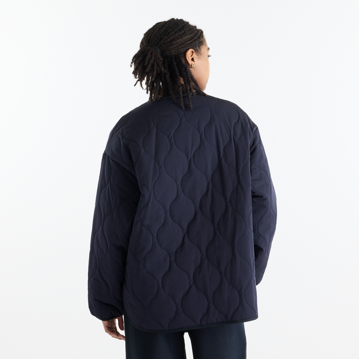 New Balance W Quilted Bomber in SCHWARZ