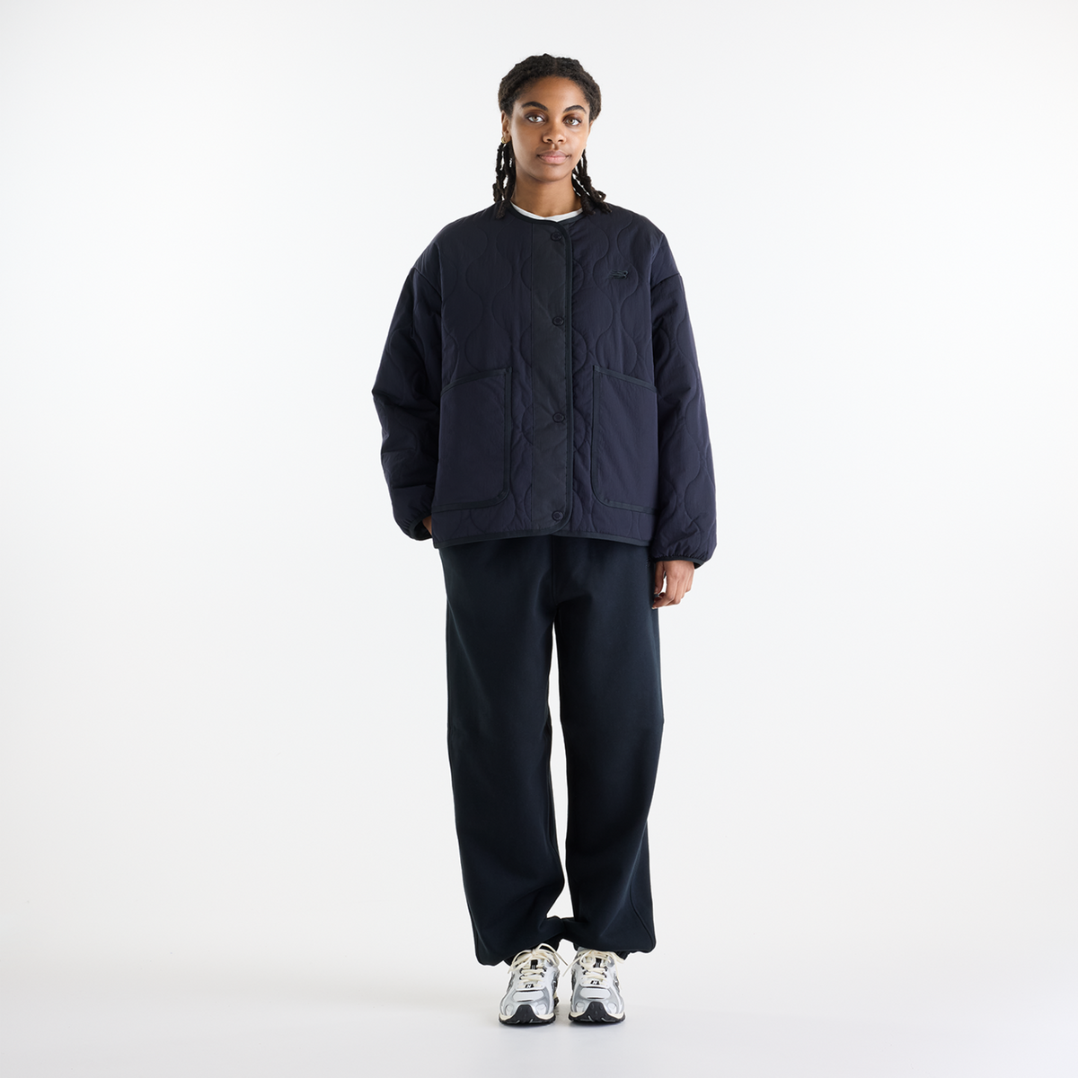 New Balance W Quilted Bomber in SCHWARZ