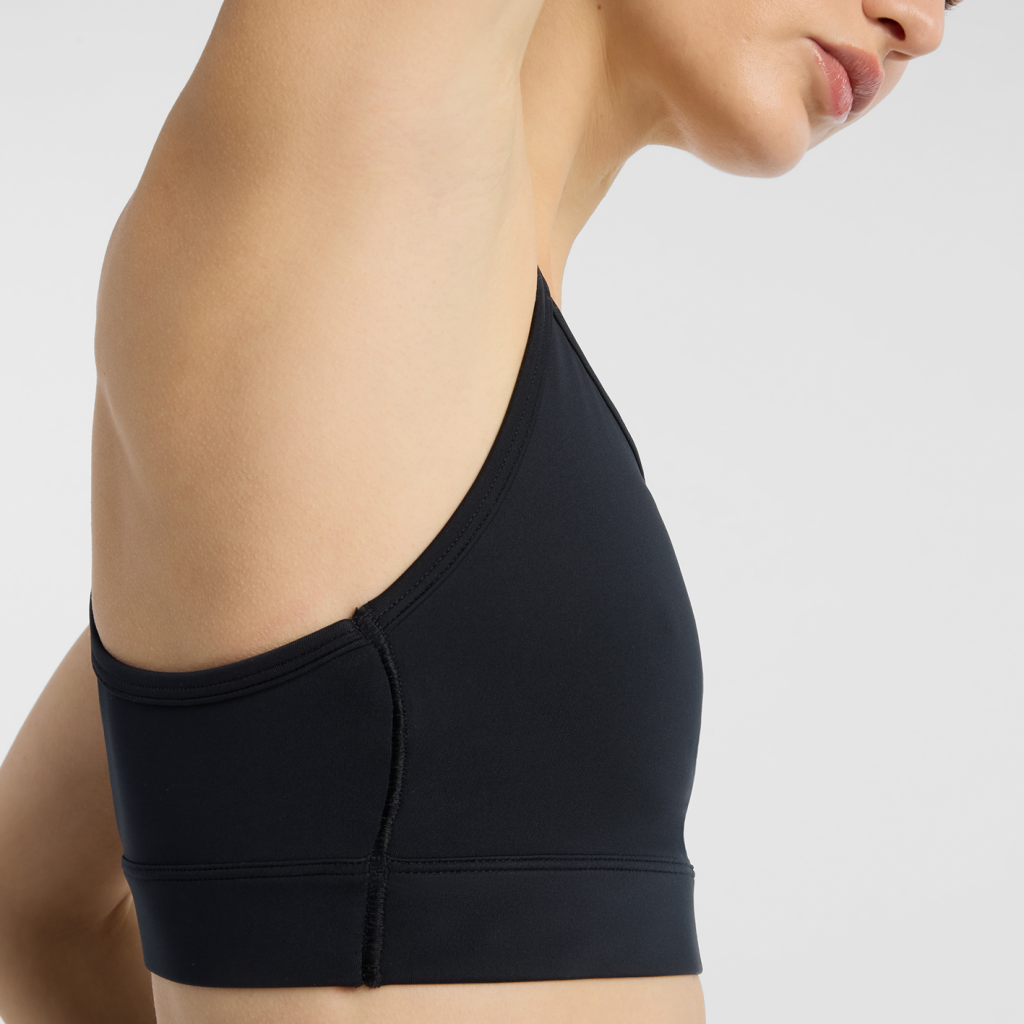 New Balance W NB Essential Yoga Bra in SCHWARZ