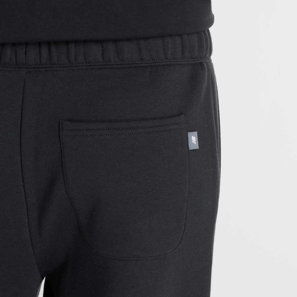 New Balance W Linear Heritage Fleece Barrel Leg Pant in SCHWARZ